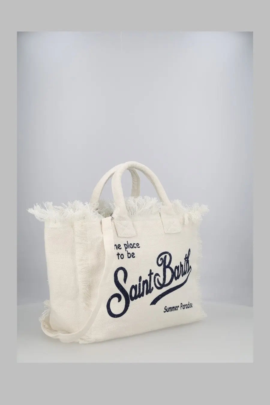 White canvas tote bag with frayed edges and black embroidered text by Mc2 Saint Barth in Lino White