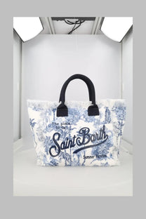 White canvas tote bag with blue tropical print black handles and saint barth branding mc2 saint barth women’s borsa vanity medium