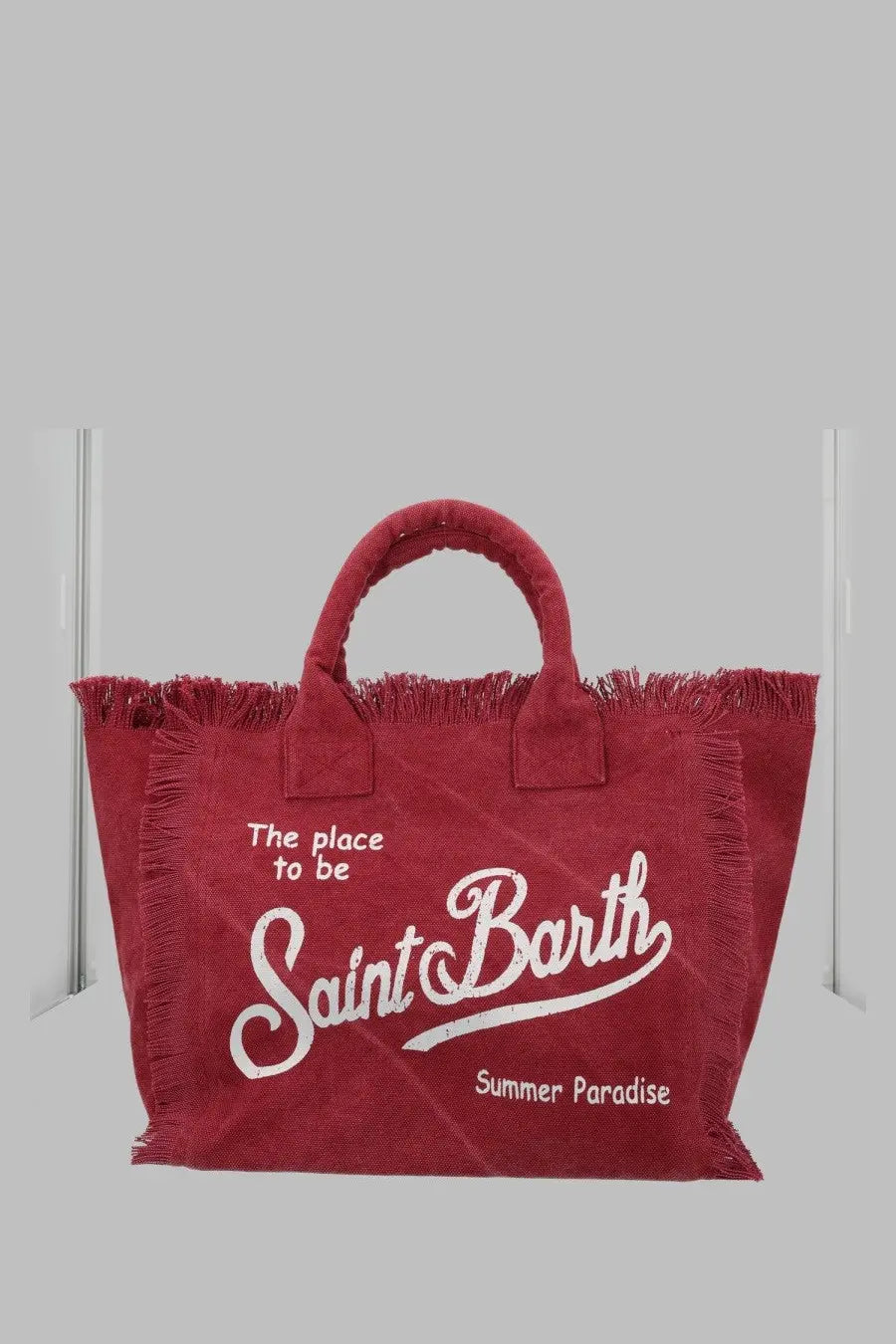 Red canvas tote bag with white frayed trim and saint barth script logo by Mc2 Saint Barth