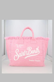 Pink canvas tote bag with frayed edges and white embroidered text from mc2 saint barth in lino blue