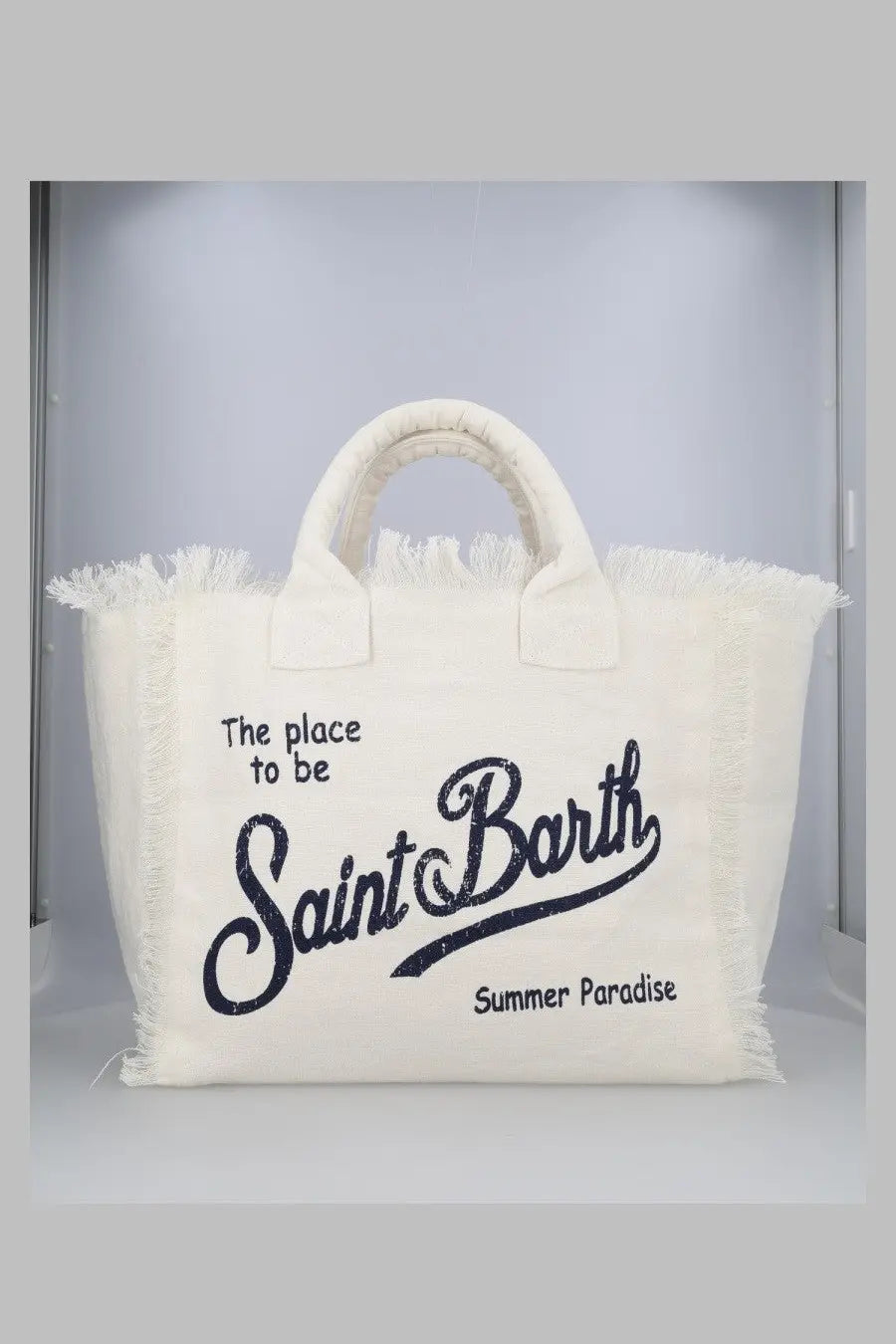 Cream-colored canvas tote bag with frayed edges and black embroidery from Mc2 Saint Barth in lino white