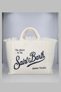Cream-colored canvas tote bag with frayed edges and black embroidery from Mc2 Saint Barth in lino white