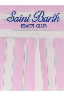 Pink and white striped cotton beach towel with saint barth beach club embroidered in blue script