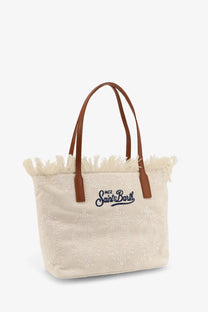 Beige canvas mc2 saint barth city shoulder bag with brown leather handles and navy embroidered logo white model