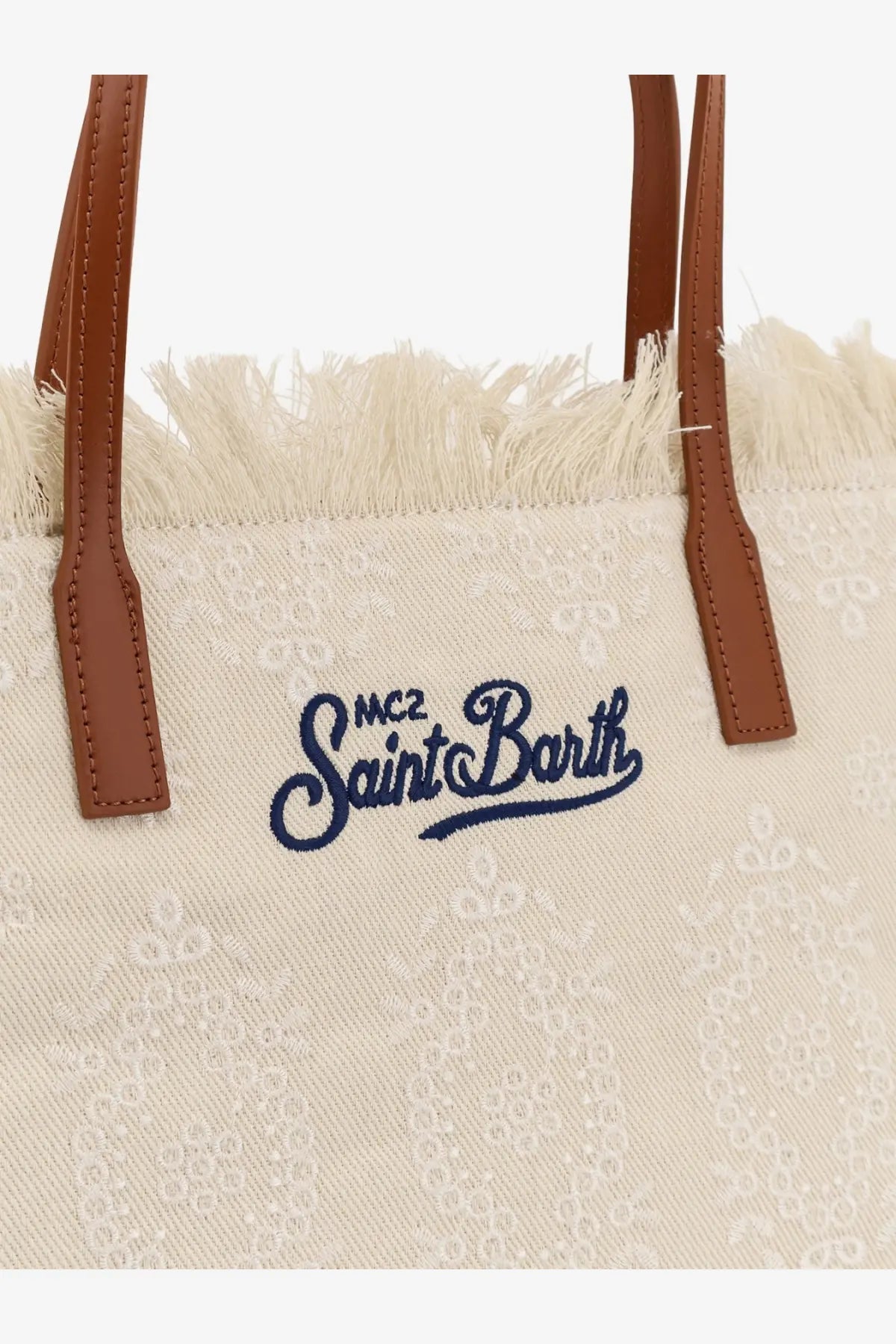Cream-colored mc2 saint barth women’s city canvas shoulder bag with brown leather handles and navy embroidered logo