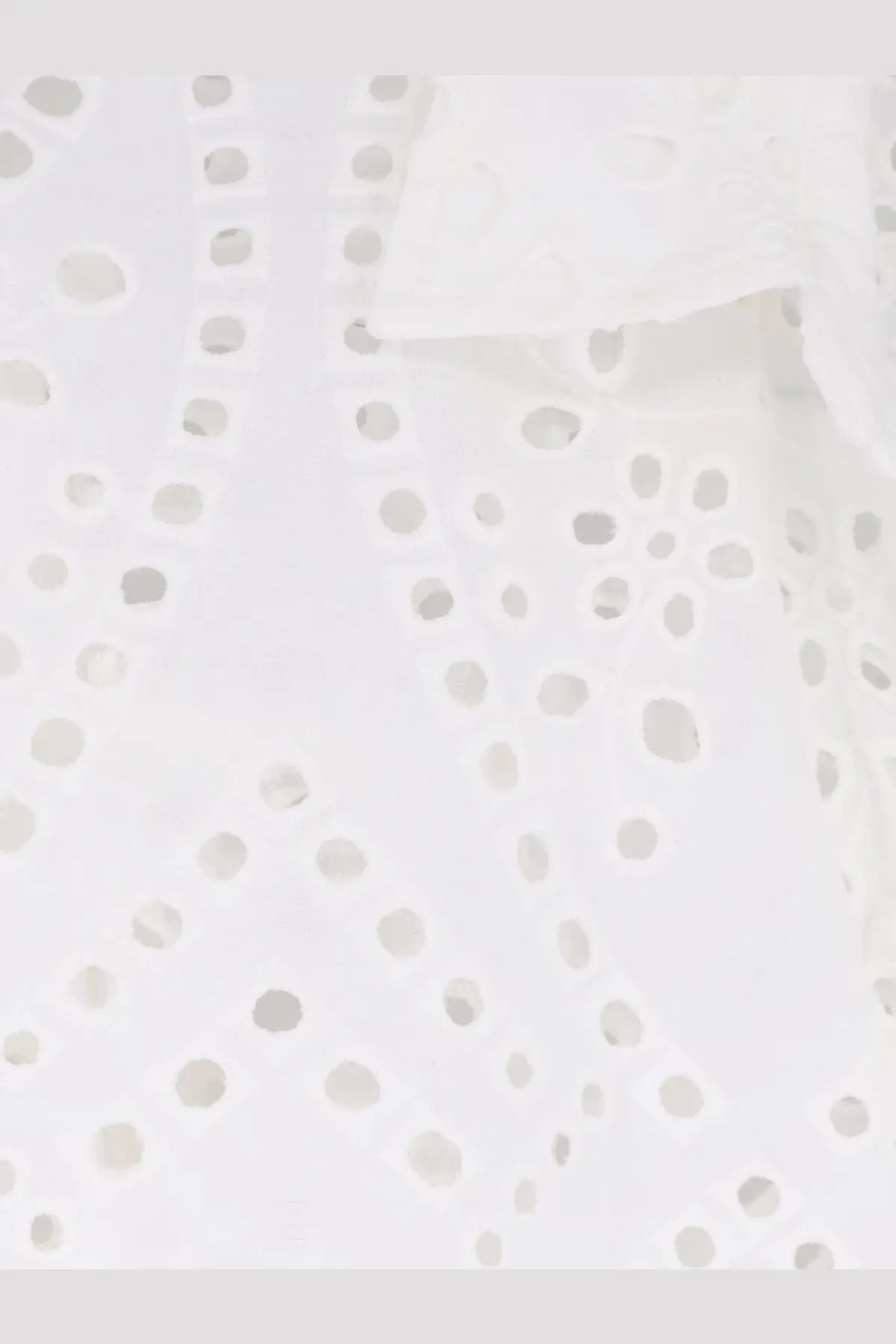 White eyelet fabric with delicate circular perforations on mc2 saint barth women’s cristal broderie anglaise shirt