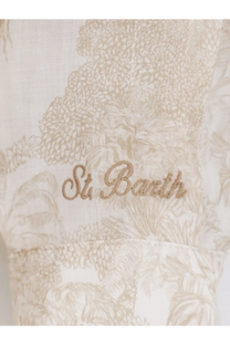 A delicate cream-colored dress with intricate floral pattern and embroidered text st in Mc2 Saint Barth design