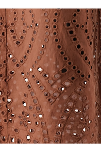 A rust-colored mc2 saint barth women’s inez sangallo lace trousers featuring intricate eyelet embroidery with geometric and floral patterns