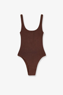 A sleek ribbed brown one-piece swimsuit with thin straps and a flattering cut by Mc2 Saint Barth