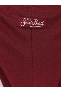 A maroon knit garment with a white embroidered mc2 saint barth label in the women’s moana nylon bikini red collection
