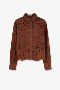 Brown eyelet blouse with classic collar and button-down front featuring intricate circular cutouts from mc2 saint barth