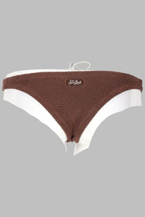 Brown knitted cheeky bikini bottom with white trim and saint laurent label from mc2 saint barth women