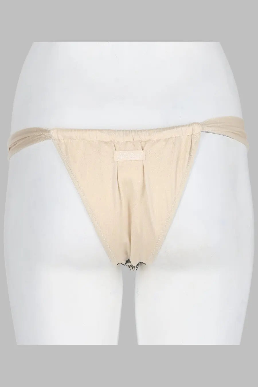 Beige thong with subtle lace trim at leg opening from mcs saint barth womens slip bikini noelle collection