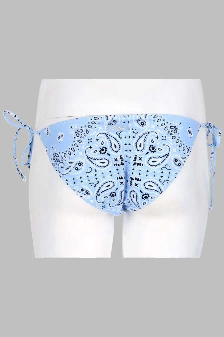 Mc2 Saint Barth women’s slip bikini bottom in virgo blue with black paisley star motifs and adjustable side ties