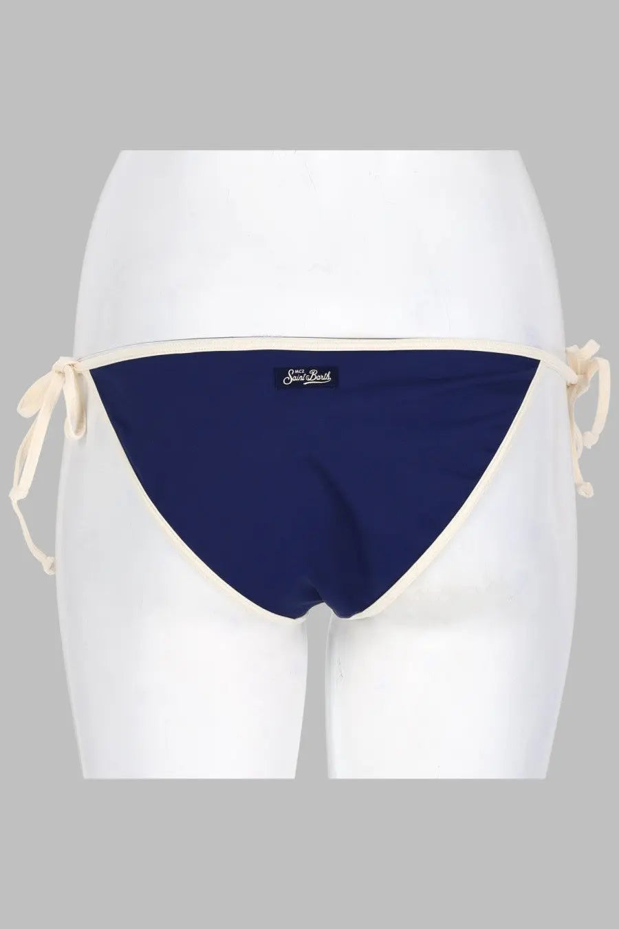 Navy blue bikini bottom with cream trim and tie-side strings from mc2 saint barth women’s slip bikini virgo blue collection