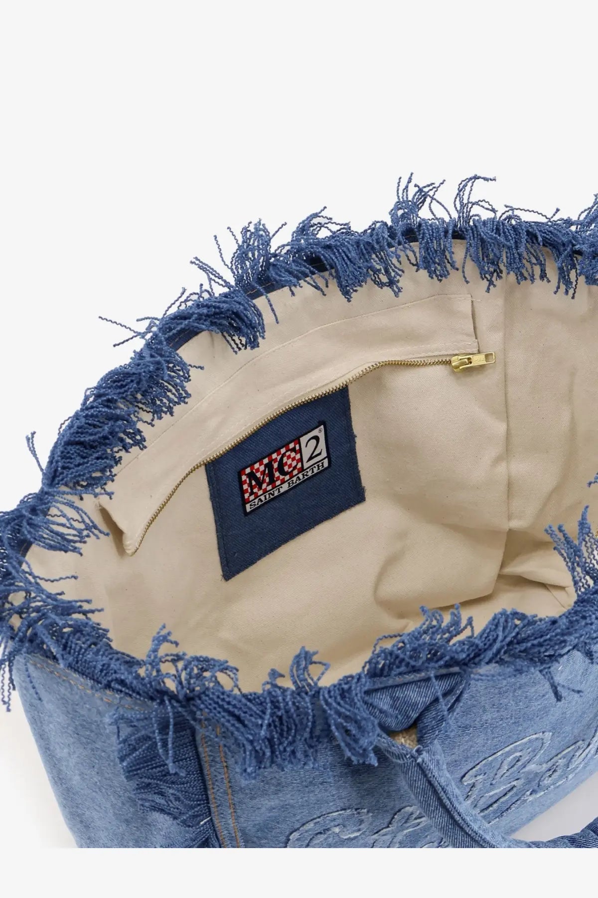 Mc2 Saint Barth women’s vanity denim shoulder bag blue with frayed edges and beige interior in blue denim