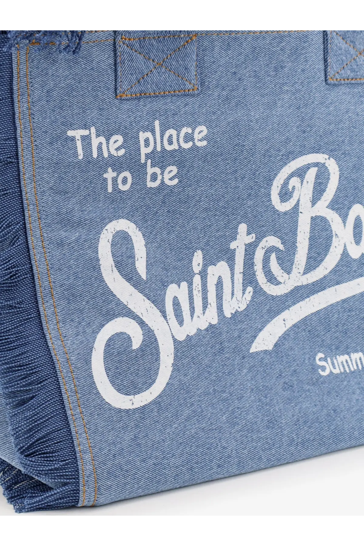 Blue denim shoulder bag by mc2 saint barth with white distressed lettering the place to be saint bar summ