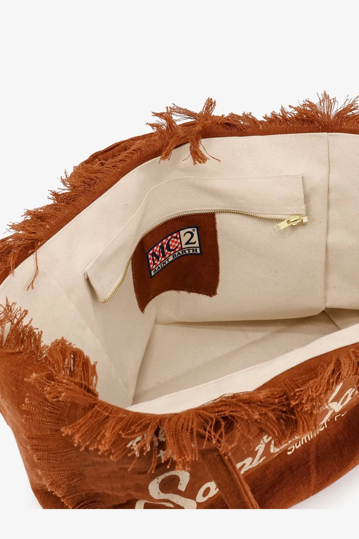 Mc2 Saint Barth women’s brown linen shoulder bag with rust-colored canvas, frayed edges, cream interior, and mo2 earth label