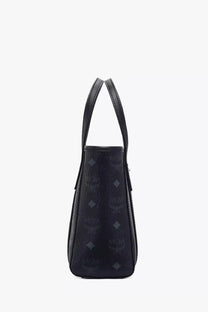 Black mcm women’s toni top zip mini tote bag with signature logo pattern and leather handles