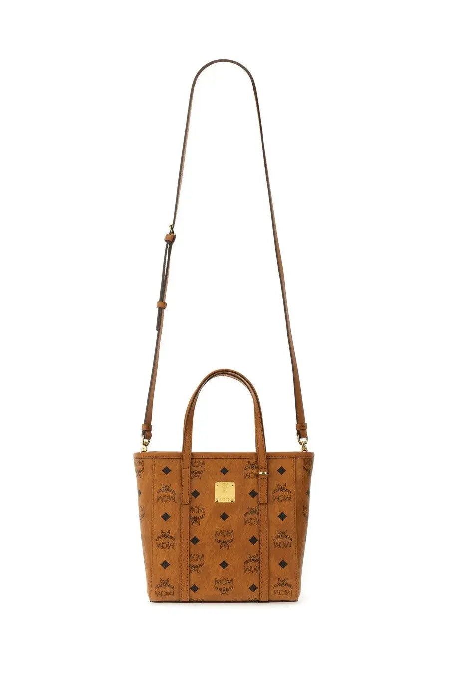 Tan mcm women’s tote bag beige with signature monogram pattern and gold-tone hardware in leather material