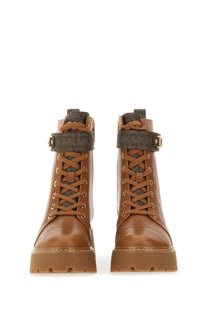 Michael Kors women’s amphibious boot mandy beige brown leather combat boots with chunky sole gold eyelets and ankle straps