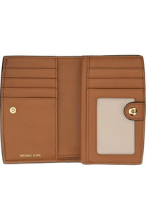 Tan leather michael kors women’s bryant medium wallet with gold-tone hardware and clear id window beige color