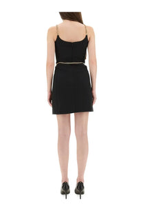 Michael Kors women’s bustier minidress in black with gold chain straps and a matching belt for elegant wear