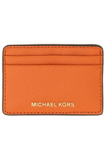 Michael Kors women’s card holder in orange leather with gold-tone branding and contrasting dark stitching