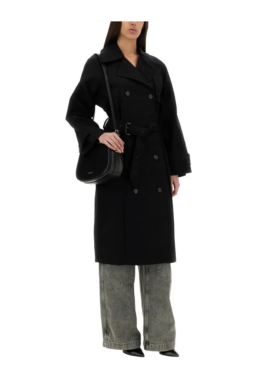 Black double-breasted trench coat with belted waist and classic collar paired with michael kors women’s grey cargo jeans