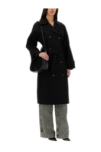 Black double-breasted trench coat with belted waist and classic collar paired with michael kors women’s grey cargo jeans