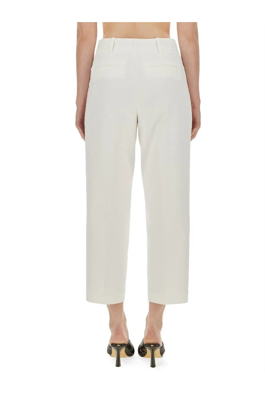 Michael Kors women’s cream-colored high-waisted cropped pants with a clean tailored fit in white fabric