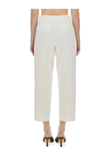 Michael Kors women’s cream-colored high-waisted cropped pants with a clean tailored fit in white fabric