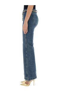 Michael Kors women’s blue denim flare fit jeans with a gold chain belt and flare leg design
