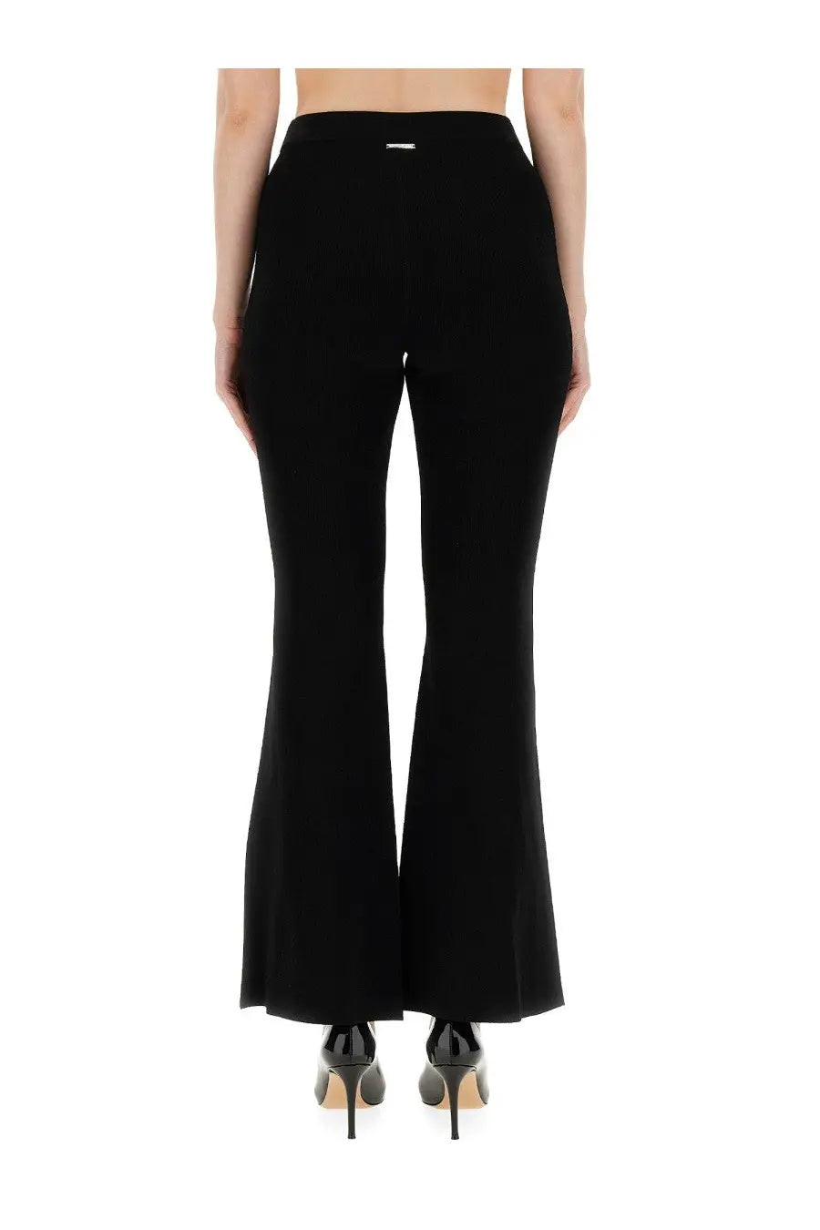 Michael Kors women’s black high-waisted flare leggings with sleek tailored fit and subtle stitching details