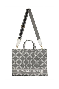 Gray michael kors women’s gigi large tote bag with white chain-link pattern and black-and-white striped shoulder strap