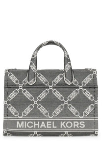 Michael Kors women’s Gigi small tote bag in gray and white woven fabric with chain-link logo pattern and branding
