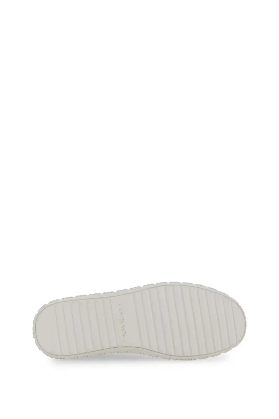 White rubber sole with textured ribbed pattern and subtle branding embossed near the heel of michael kors women’s leather sneaker