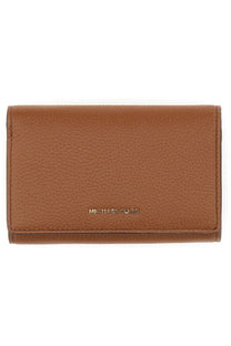Brown pebbled leather michael kors women’s wallet with gold-tone logo embossed on the front in beige color