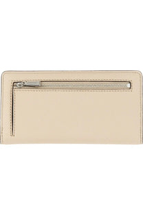 Beige michael kors women’s leather wallet with silver zipper and neat stitching