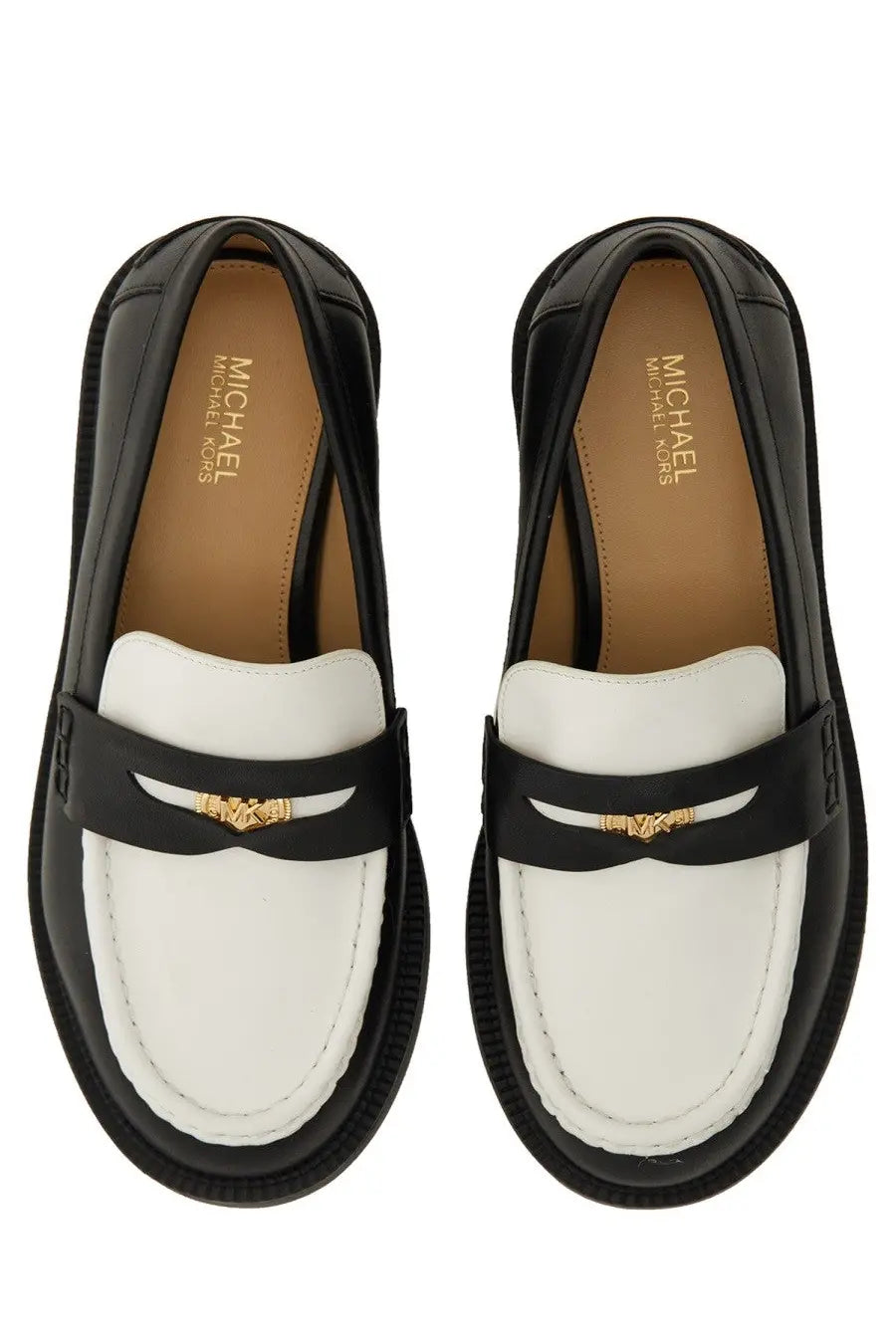 Black and white leather Michael Kors women’s loafer with gold-tone MK logo accent on the front