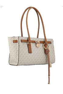 Beige michael kors women’s modern hamilton tote bag with brown leather handles and monogram pattern