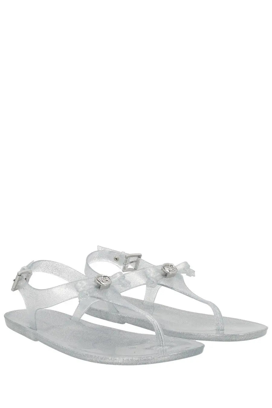 Michael Kors women’s monogram silver jelly sandals with clear glitter, delicate bows, and metallic buckle accents