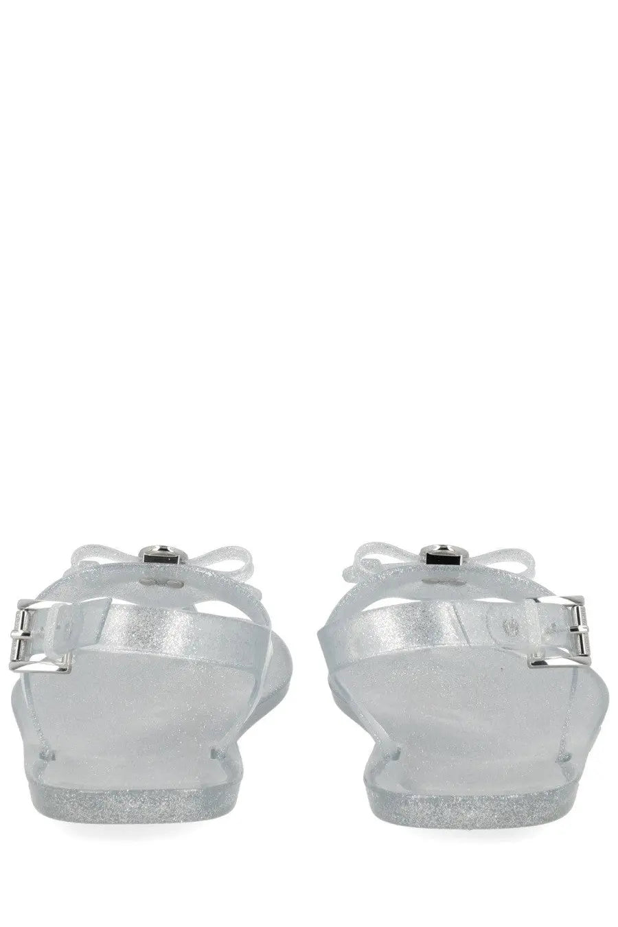 Michael Kors women’s monogram sandal clear glittery jelly with silver metallic straps and bow details