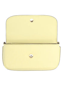 Michael Kors women’s Nolita pale yellow leather crossbody bag with silver hardware and minimalist design