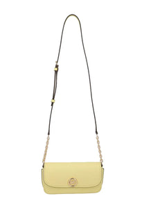 Michael Kors women’s Nolita pale yellow leather crossbody bag with gold circular clasp and black chain link strap