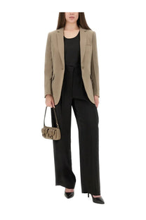 Tan leather crossbody bag with gold tone hardware and structured rectangular shape for michael kors women