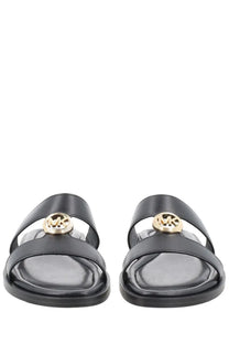 Michael Kors women’s sandalo Erin black leather sandals with gold-tone logo accents on the front