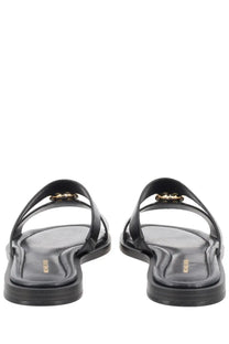 Black leather michael kors women’s sandalo erin thong sandals with gold-tone hardware and sleek design