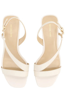 Cream-colored michael kors women’s sandalo jaida con tacco strappy sandals with gold-tone buckle accents
