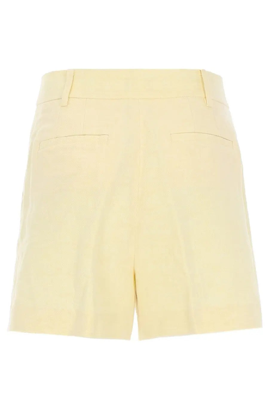 Back view of michael kors women’s cream-colored tailored shorts in lino yellow with structured waistband and two back pockets